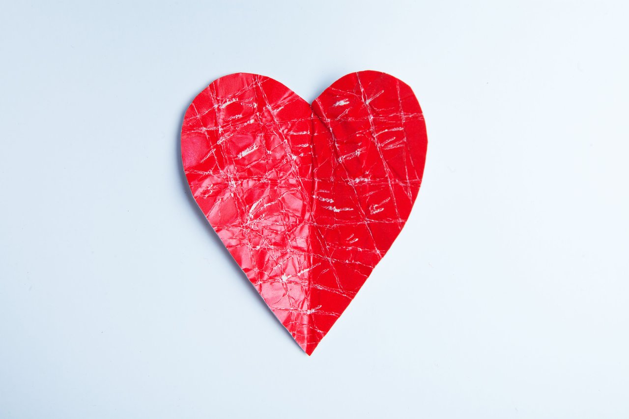 A vibrant red heart shape on a white background, ideal for love and romantic themes.