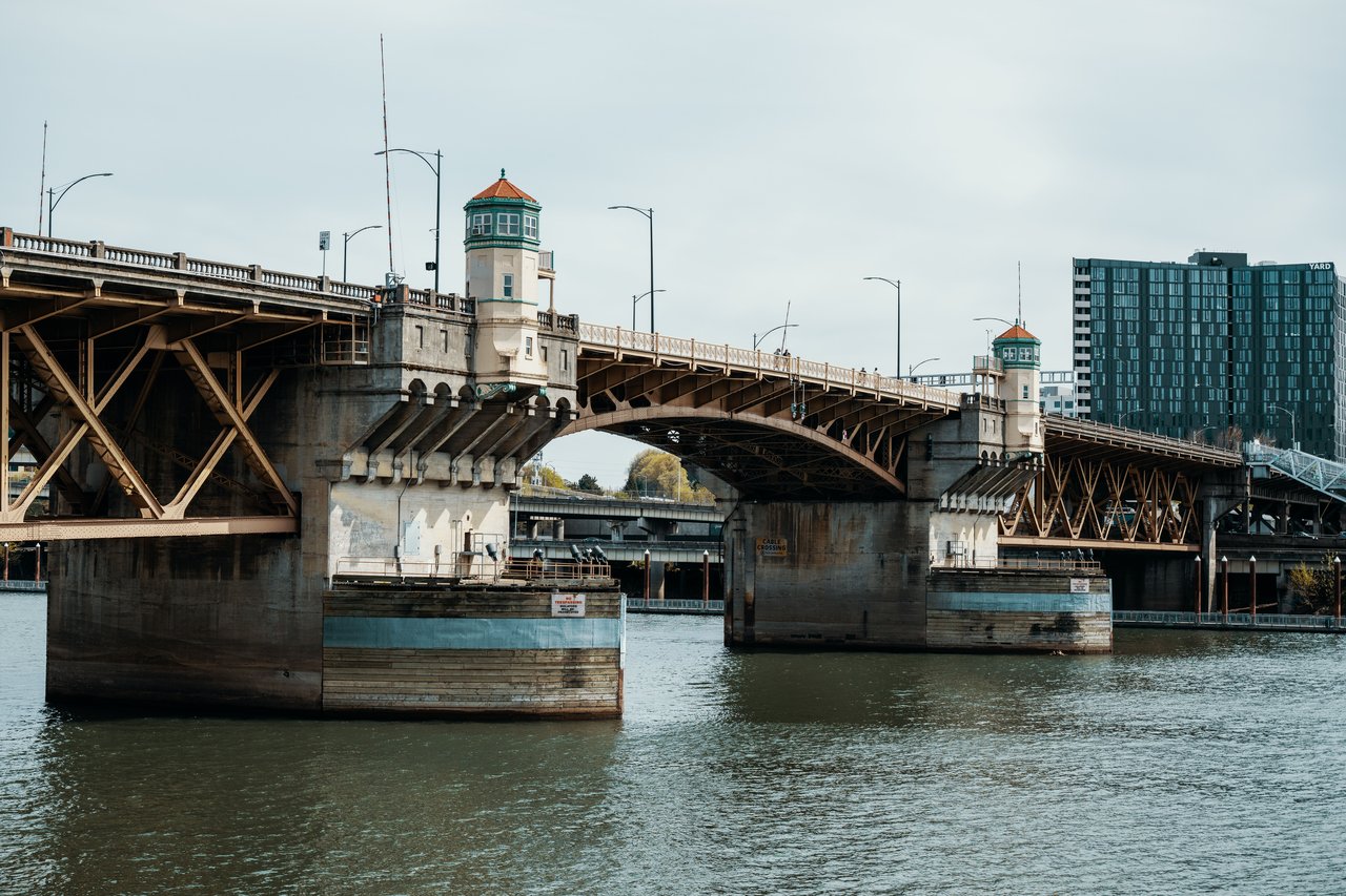 Daytime view of Burnside Bridge in Portland, Oregon, spanning the Willamette River.