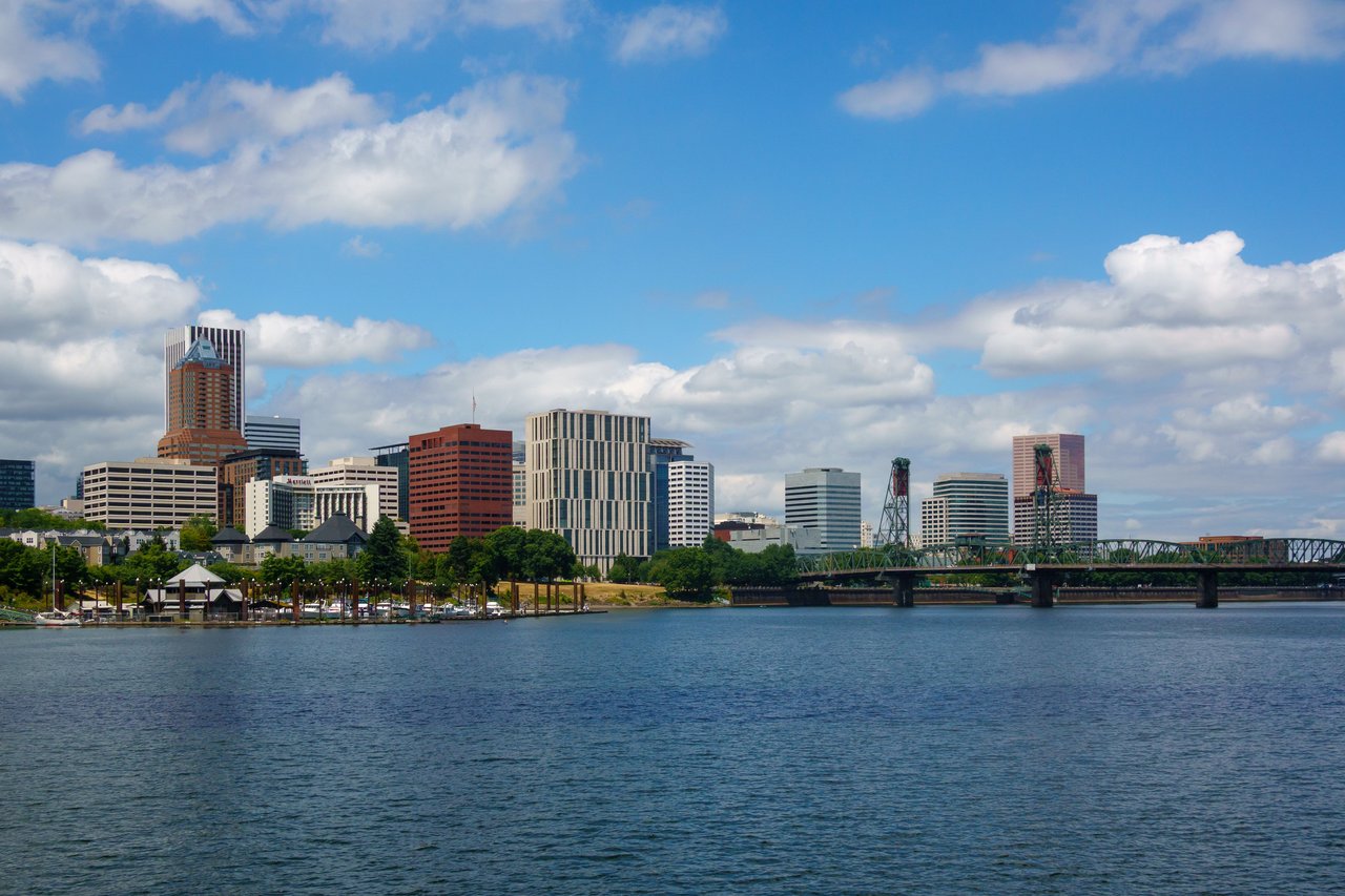 Scenic view of Portland's skyline with the iconic Hawthorne Bridge and Willamette River.