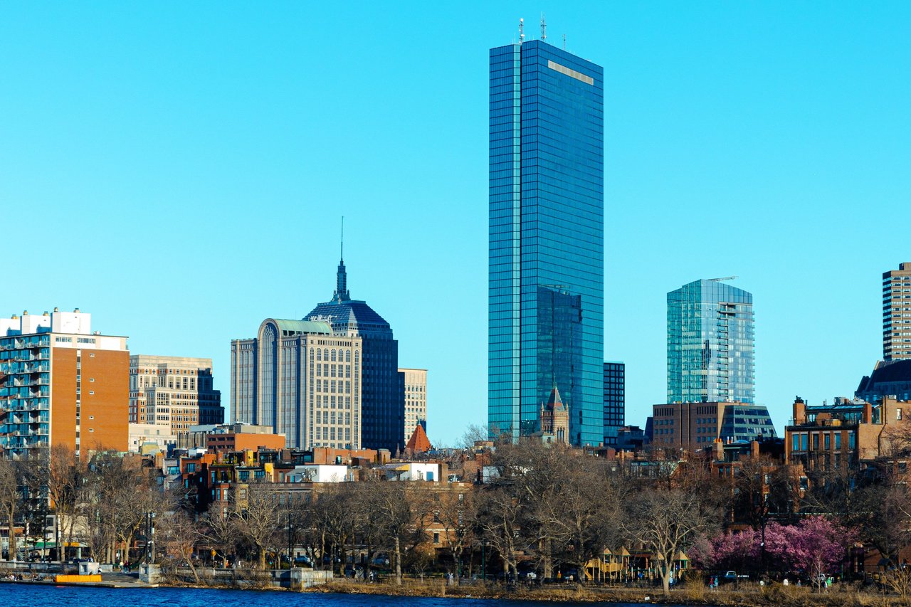 Stunning view of Boston's skyline featuring the iconic John Hancock Tower and modern architecture.