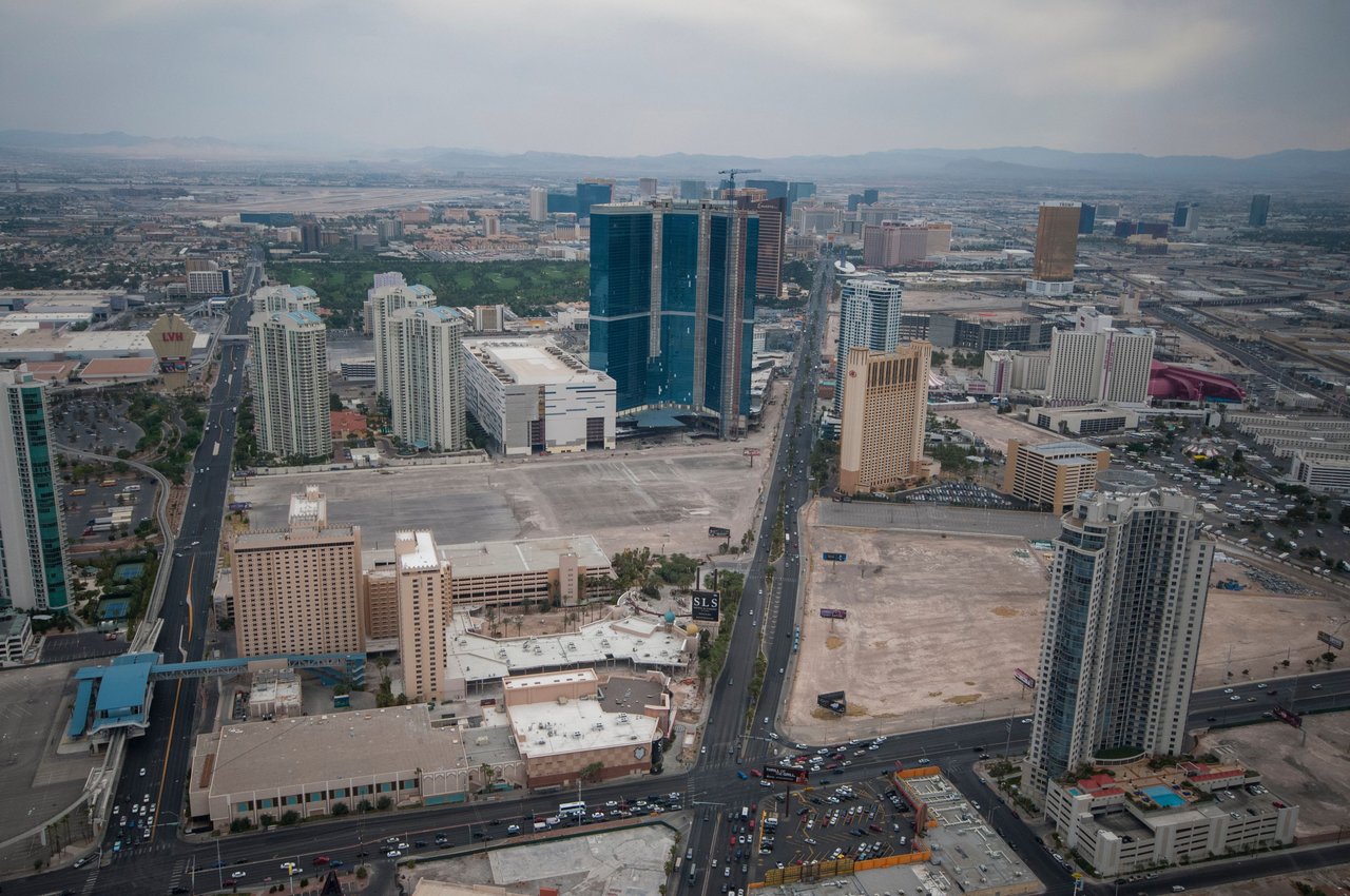 Aerial shot of Las Vegas skyline and urban landscape next to the desert.