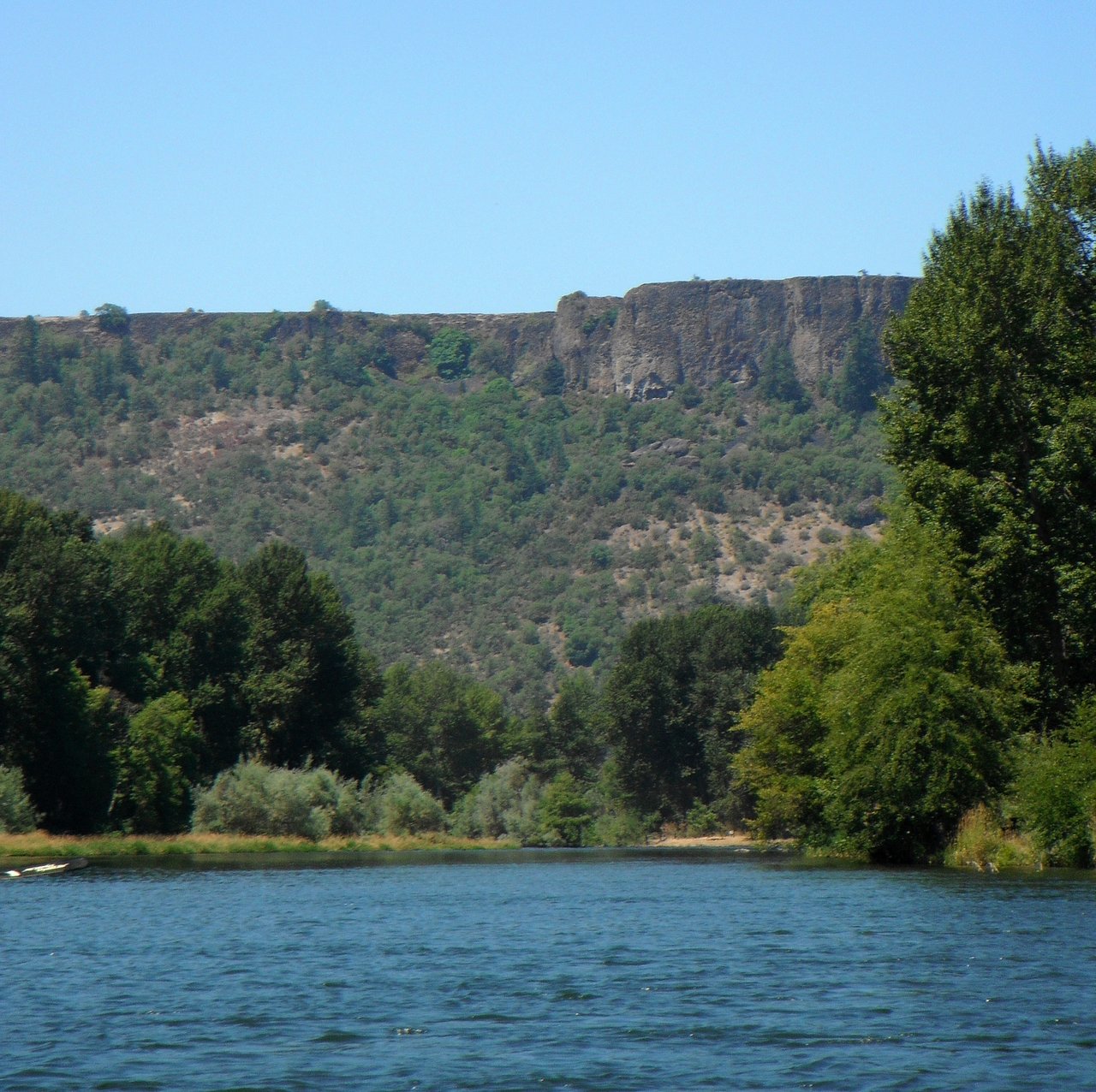 Upper and Lower Table Rocks are two of the most prominent topographic features in the Rogue River Valley. These flat-topped buttes rise approximately 800 feet above the north bank of the Rogue River i